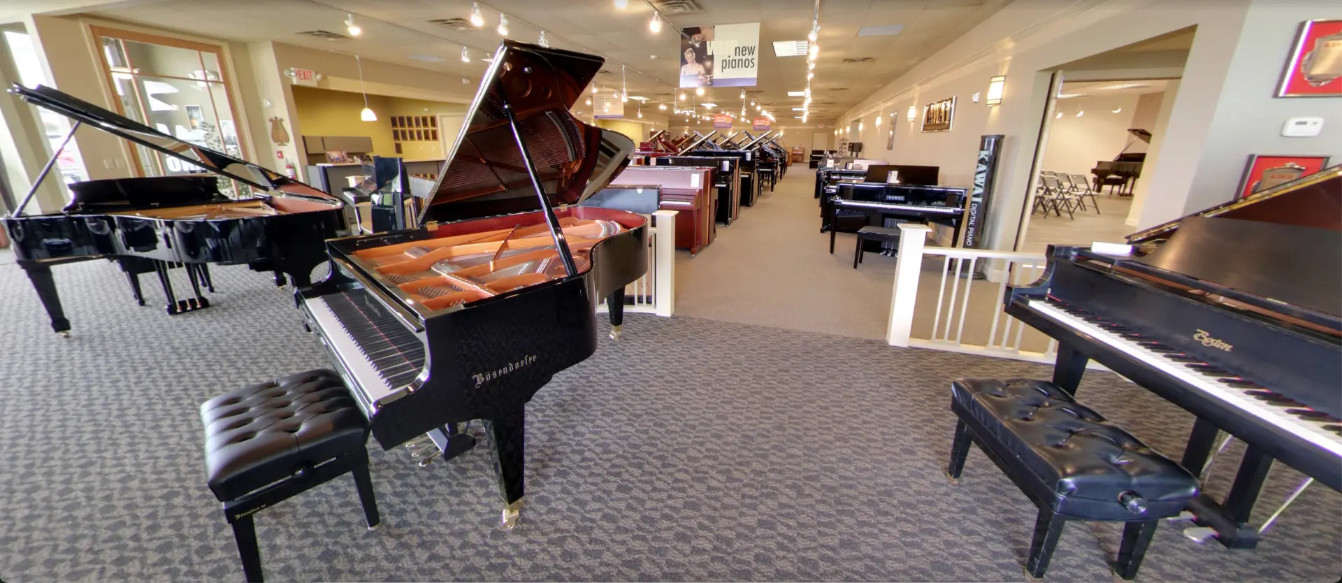 Wide view of the West Michigan Piano showroom floor